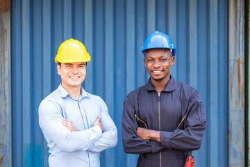 Selective focus African men worker and Caucasian freight supervisor