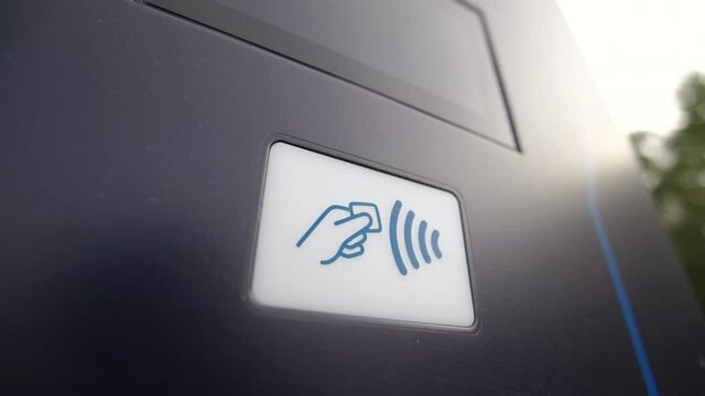 Wireless payment sign at electric car charging station