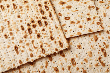 Traditional matzos as background, top view. Pesach celebration