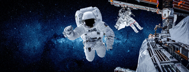 Fototapeta na wymiar Astronaut spaceman do spacewalk while working for space station in outer space . Astronaut wear full spacesuit for space operation . Elements of this image furnished by NASA space astronaut photos.