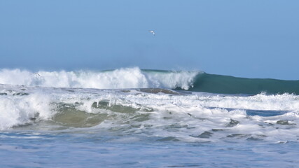 Surf breaking at the beach Holywell Bay, Cornwall