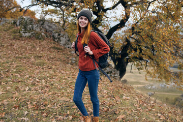 woman hiker backpack nature autumn forest travel