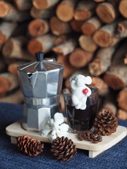 moka pot coffee maker morning fresh with firewoods background 