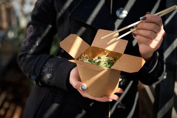Cardboard containers for food, Rice noodles with sprouts, vegetables and tender tofu, Thai dish