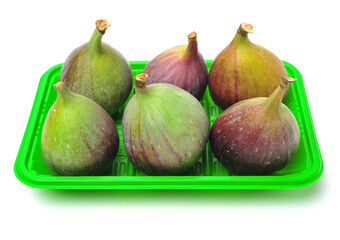 Ripe figs on a white background