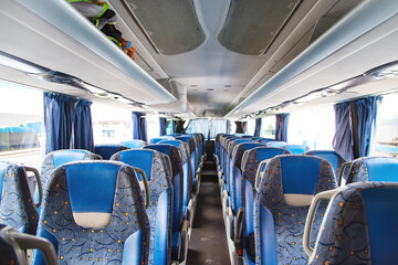 Fototapeta premium Public urban transport. Empty interior of the bus.