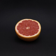 grapefruit on a black background