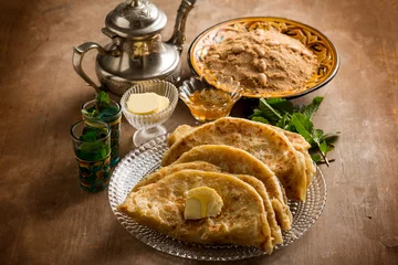 Zelfklevend Fotobehang morocco traditional breakfast with sello bread and mint tea © Marco Mayer
