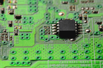 close-up of a printed circuit board with microchips and radio parts with a processor. Background for electronics