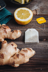 Fresh raw ginger roots with lemon