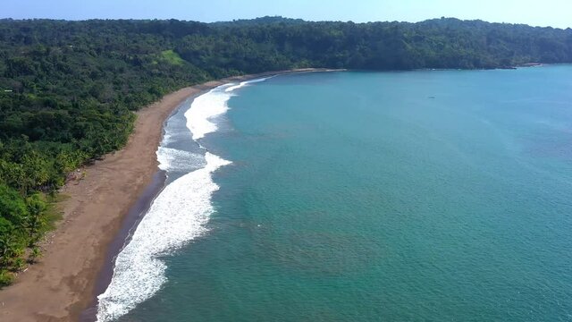 Drone flies over the empty Playa San Josecito beach in Corcovado National Park on the Osa Peninsula in Costa Rica