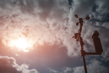 modern anemometer or weather wind vane for measuring meteorology conditions - obrazy, fototapety, plakaty