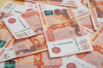5000 rubles background. Russian banknotes at different angles.