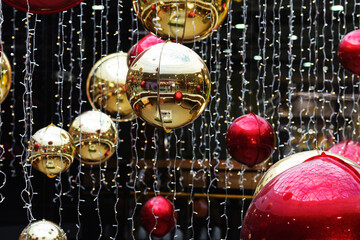 Background of large balls of red and gold color. Festive background.