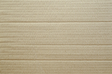 Cardboard texture, Paper box or packing paper, Brown horizontal corrugated and folded use for background, Close up	