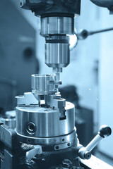 CNC lathe or Drilling lathe. High-tech processing concept.