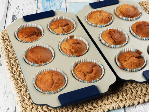 Homemade banana muffins in trays. No sugar added. Toddler food.