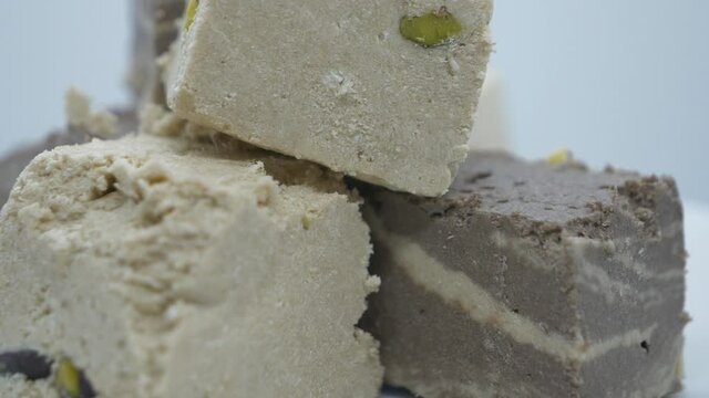 A close up view of pistachio halva and chocolate halva in Ramadan.