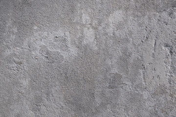 Rough texture of gray plastered concrete wall. Design background.