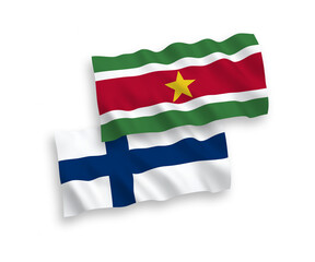 Flags of Finland and Republic of Suriname on a white background