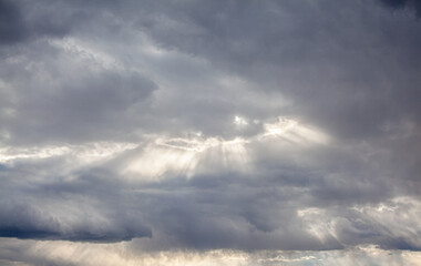 Obraz premium Dramatic sky with grey clouds over the city before the storm. Weather before or after a storm.