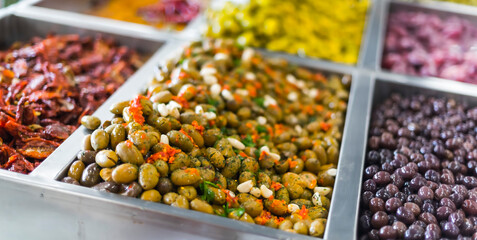 Fresh olives put up for sale in a supermarket.