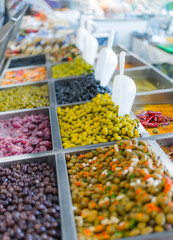 Fresh olives put up for sale in a supermarket.