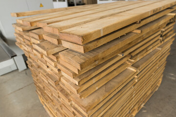 The close up of folded decorative stuff untreated wooden blocks in production