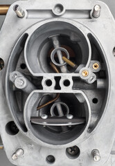 Top view of dual chamber of car carburetor for internal combustion engine for mixing air with a...