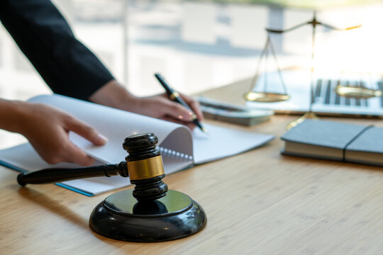 Attorneys Or Judges Sitting At Work To Sign Important Documents, Attorneys And Law, Legal Concepts Of The Judiciary And The Legislature.