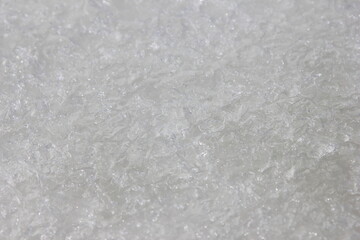 Obraz premium the surface of ice melting in the spring sun