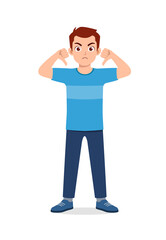 Fototapeta premium young good looking man doing thumb down pose