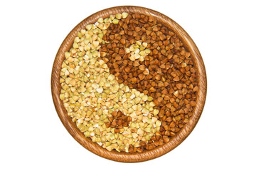 Yin yang. Green buckwheat and brown isolated on white background. Healthy and organic food
