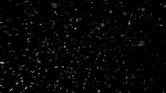It is snowing in cold winter, Beautiful Real snow falls on black background