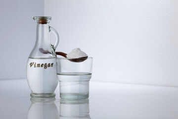 baking soda and vinegar on white background
