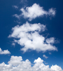 blue sky background with tiny clouds