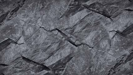 Rock texture. Gray grunge background with copy space for design. Web banner. Mountain texture. Detail.