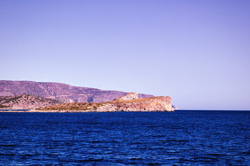 Wind energy. Blue sea against Wind generators on top of the mountain hill on a crete island. wind turbine. Crete, Greece