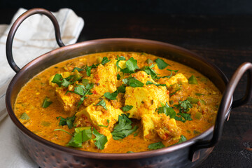 Kadai Paneer Gravy in a Balti Dish: A traditional vegetarian Indian dish of paneer cheese in a tomato-based sauce