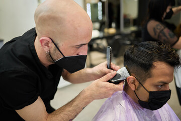 barber wearing mask shave man with razor