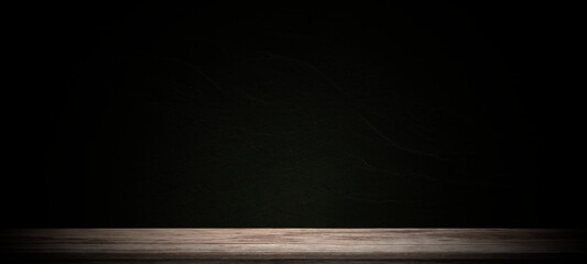Wooden old tabletop and dark plaster wall background for montage product display or design key...