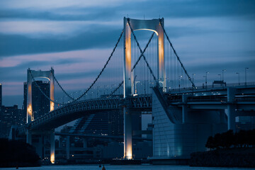 Fototapeta na wymiar Rainbow bridge over the river , Tokyo Japan