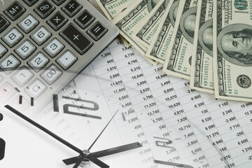 Business concept with calculator, money, financial report and clock
