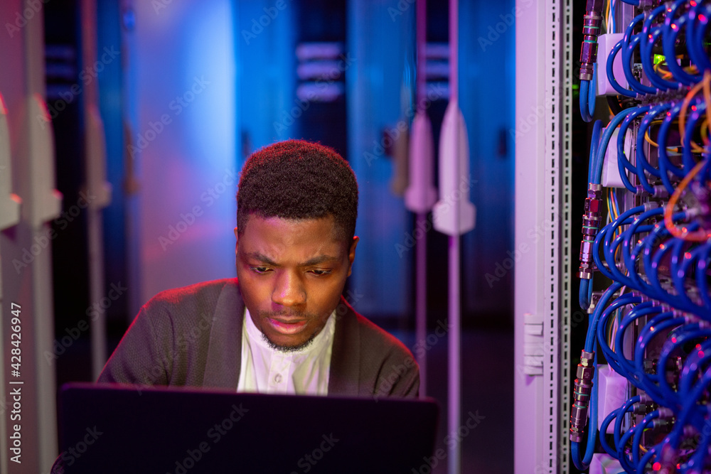 Poster Busy IT engineer administrating computer network