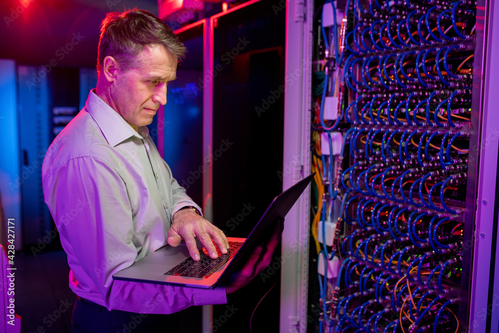 Poster mature it engineer working with server