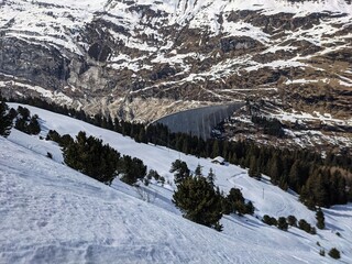 reservoir, large dam in the valser valley in the zervreila.Zervreila Lake Ski run from the Fanellhorn.mountain landscape