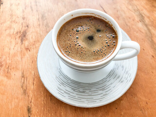 cup of turkish coffee on a wooden table