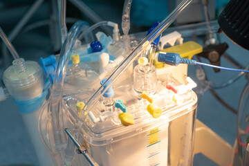 Heart lung machine for heart surgery in operating room. Roller pumps of heart lung machine for...