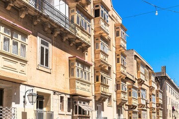Malta, Valletta, August 2019. Typical Maltese houses with wooden balconies.