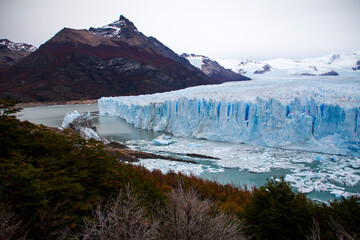 Perito Moreno Glaciar and its fragments in a cold lake